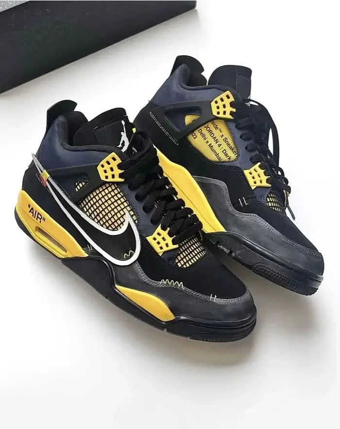 Black and yellow sneakers on a white background