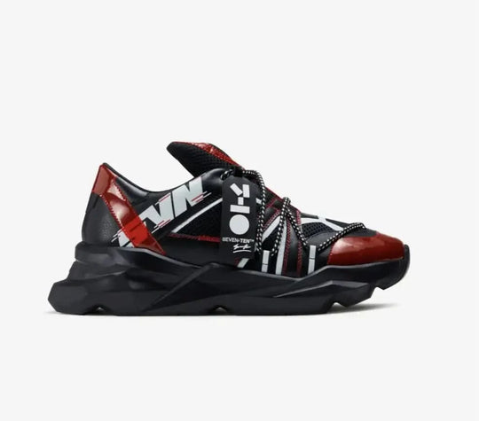 Black, red, and white sneaker with unique design on a white background