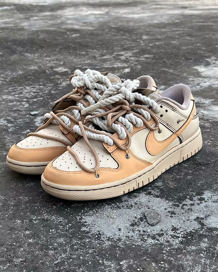 Nike Coffee Dunk Low sneakers in earthy tones with chaotic laces, limited edition of 900 pairs
