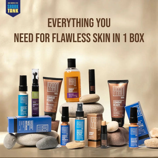 Men's Arsenal set skincare and makeup essentials for flawless skin in one box displayed with natural stones